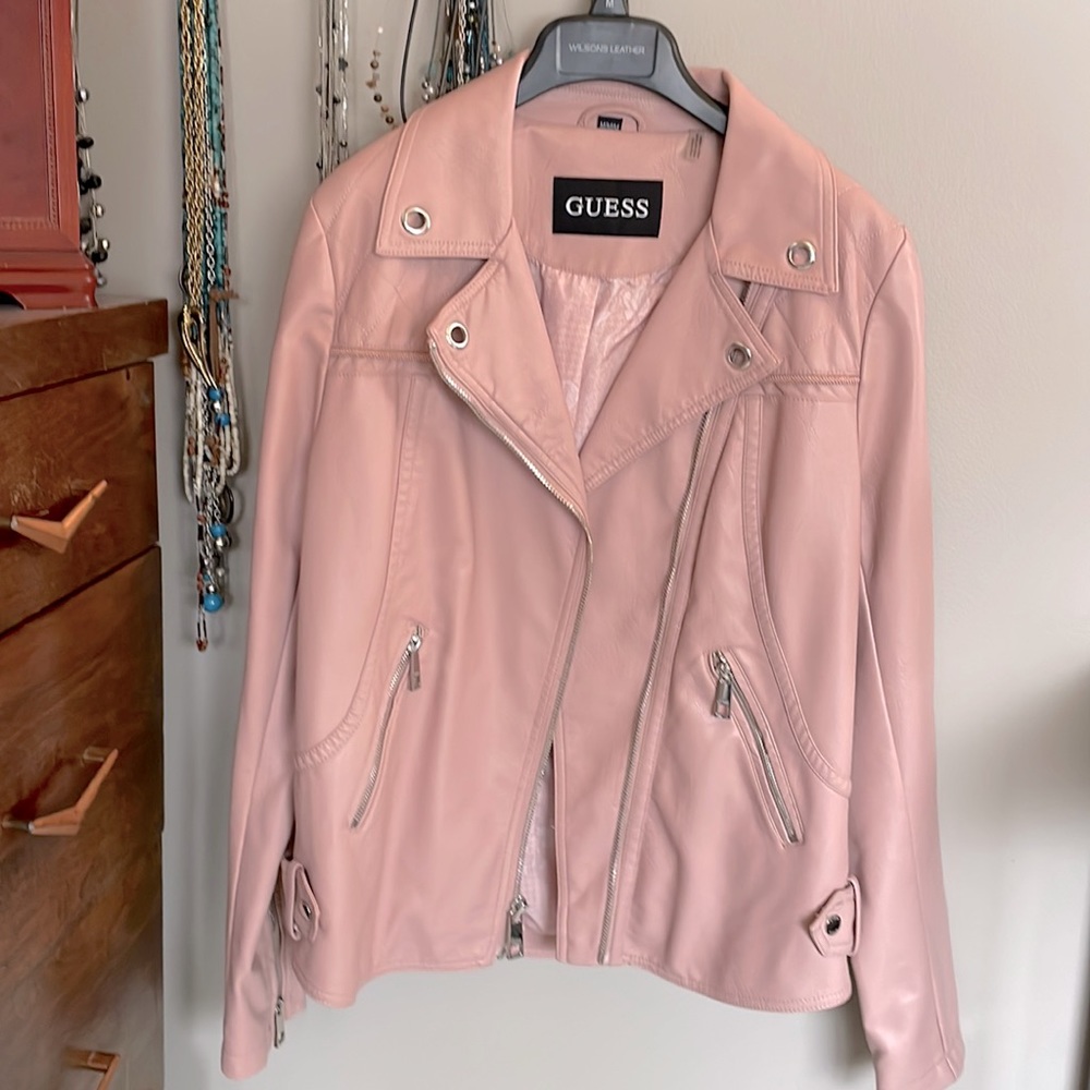 Guess pink faux leather moto jacket. Size Med w floral lining, zippers grommets.